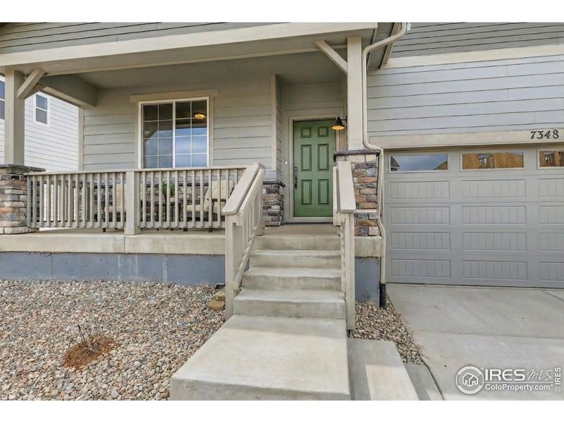 Covered front patio and 2 car attached garage