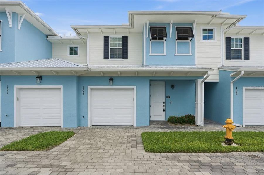 Front exterior of a new home in , Bonita Springs, FL, highlighting curb appeal (Image 26).