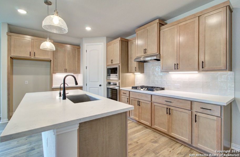 Furnished interior view inside a new home in Prairie Green, Converse (Image 5). Furnished interior view inside a new home in Prairie Green, Converse (Image 5).
