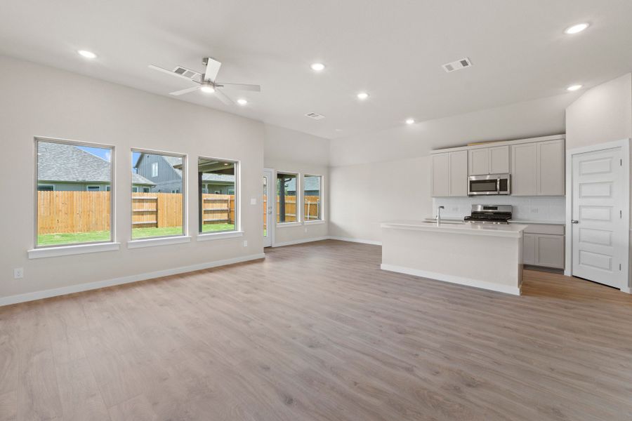 Representative unfurnished interior of a home built from the Nueces by Trophy Signature Homes in Prairie Winds, Hutto (Image 15).