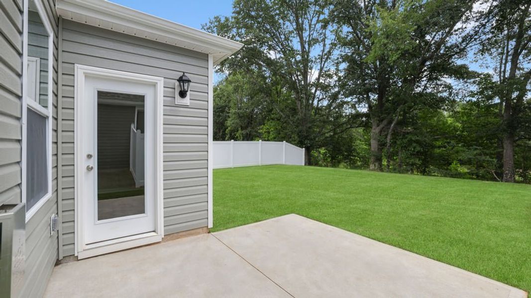 Exterior details and patio area of a home in Sage Grove, Lyman (Image 28).