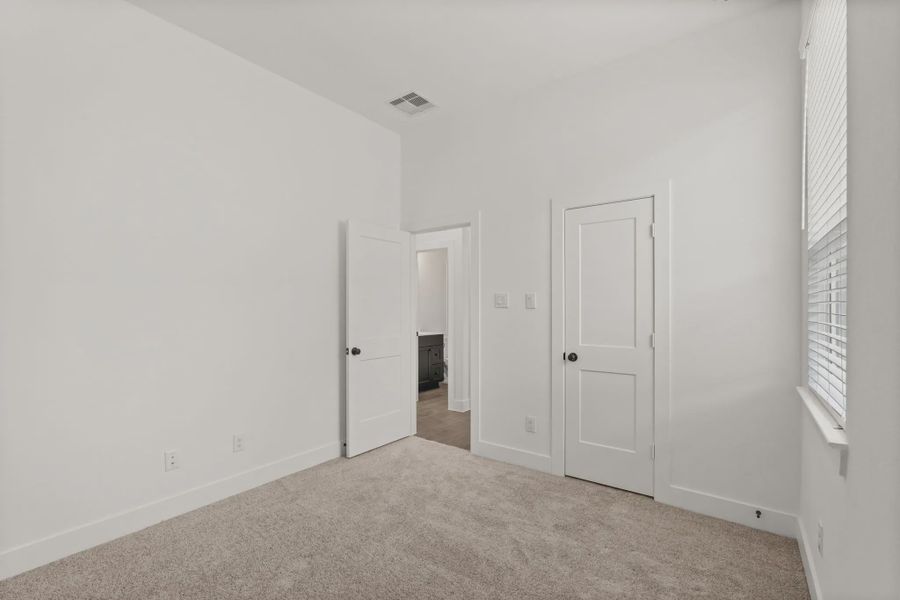 Representative unfurnished interior of a home built from the Rowen by Chesmar Homes in Brookewater 45's, Rosenberg (Image 25).