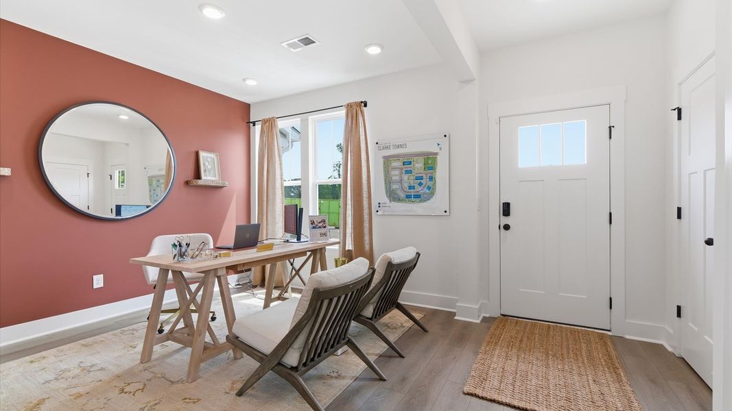 Accomplished hardwood flooring foyer sets the tone for tasteful design throughout the home at the Churchill Design Accomplished hardwood flooring foyer sets the tone for tasteful design throughout the home at the Churchill Design