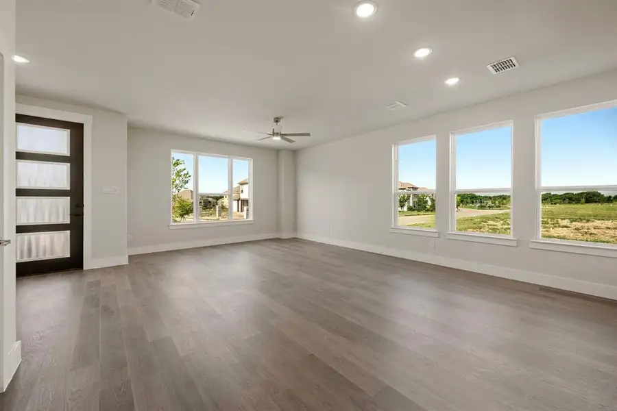 Light, bright and airy, this new family room is everything you have been searching for!