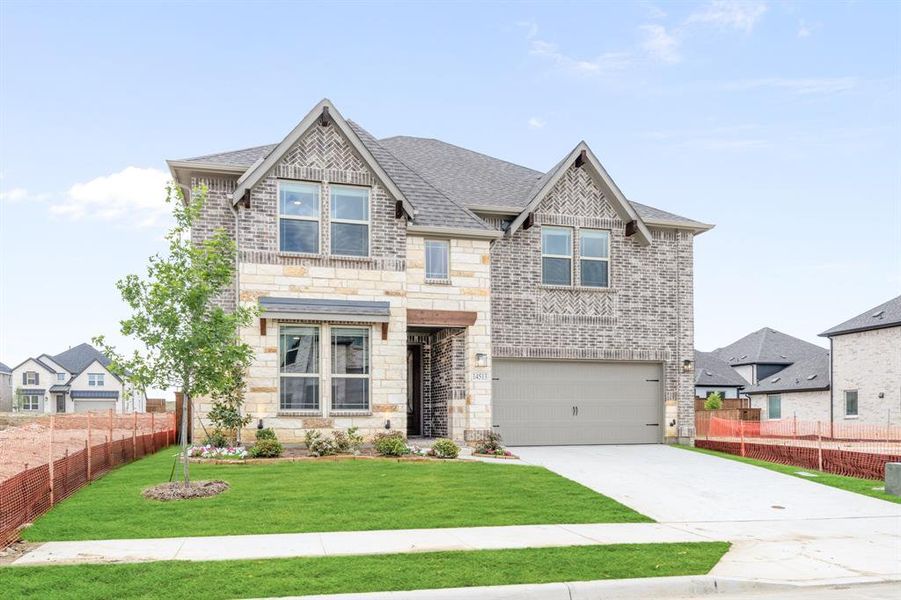 Front exterior of a new home in Creekview Meadows, Pilot Point, TX, highlighting curb appeal (Image 2).