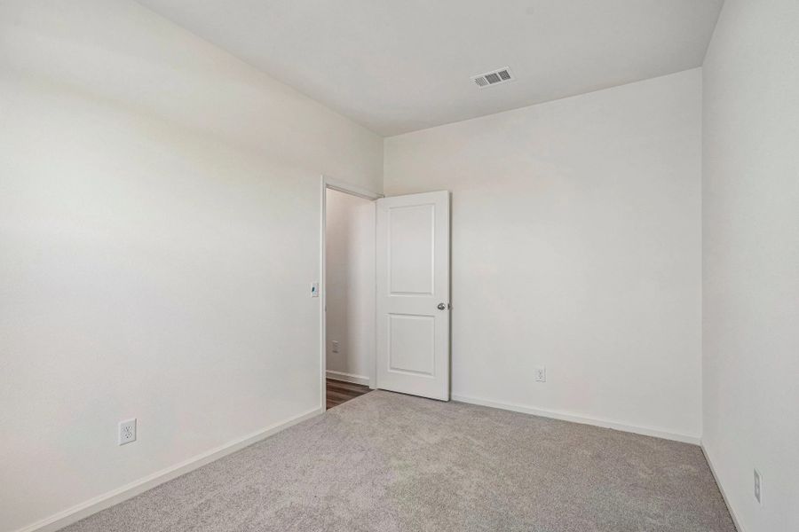 Representative unfurnished interior of a home built from the The Enterprise by Starlight Homes in Windmill Farms, Forney (Image 16).