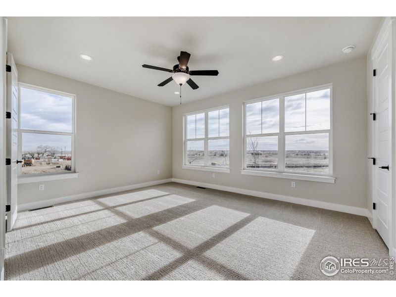 Spacious, unfurnished interior of a new home in Barefoot Lakes, Firestone (Image 21).