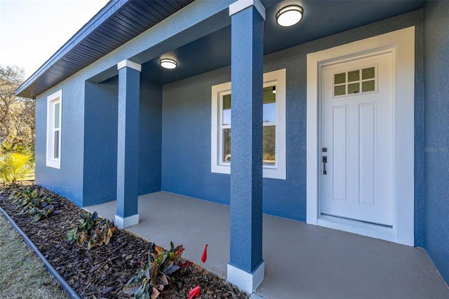 Exterior details and patio area of a home in , Avon Park (Image 31). Exterior details and patio area of a home in , Avon Park (Image 31).