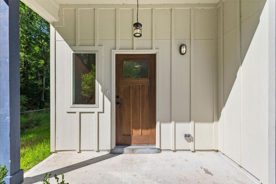 Exterior details and patio area of a home in , Conroe (Image 3).