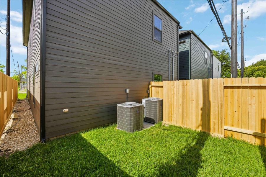 Exterior details and patio area of a home in , Houston (Image 4).