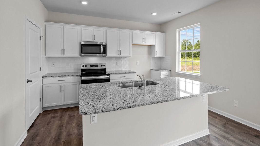 Furnished interior view inside a new home in Tyler - Home on the Lake, New Bern (Image 2).
