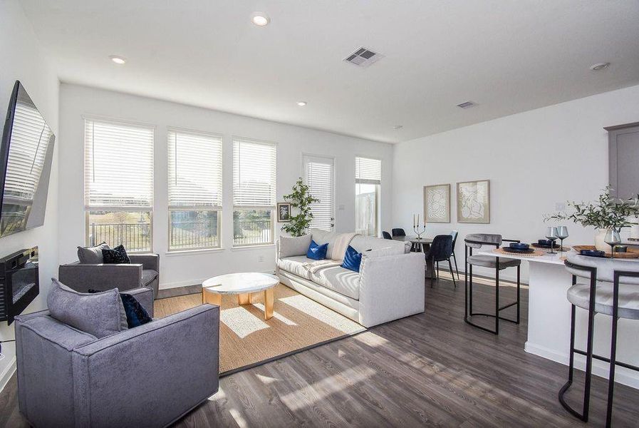 Sun-filled open living space with modern finishes and seamless flow perfect for entertaining or relaxing in style.