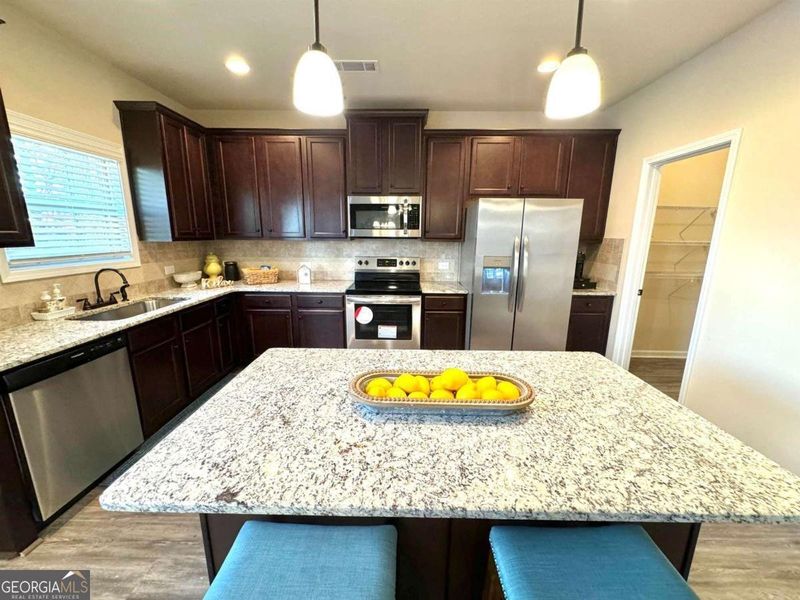 Furnished interior view inside a new home in Laney Place, Rex (Image 2).