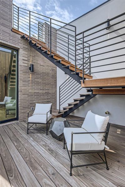 A modern outdoor living space, perfect for unwinding under an open sky. A modern outdoor living space, perfect for unwinding under an open sky.