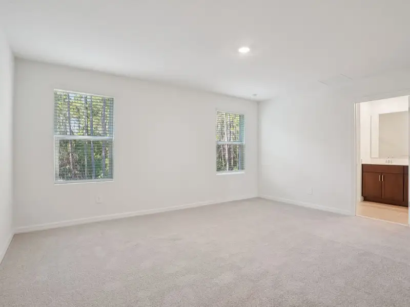 Spacious, unfurnished interior of a new home in The Meadow at Crossprairie Townes, St. Cloud (Image 11).
