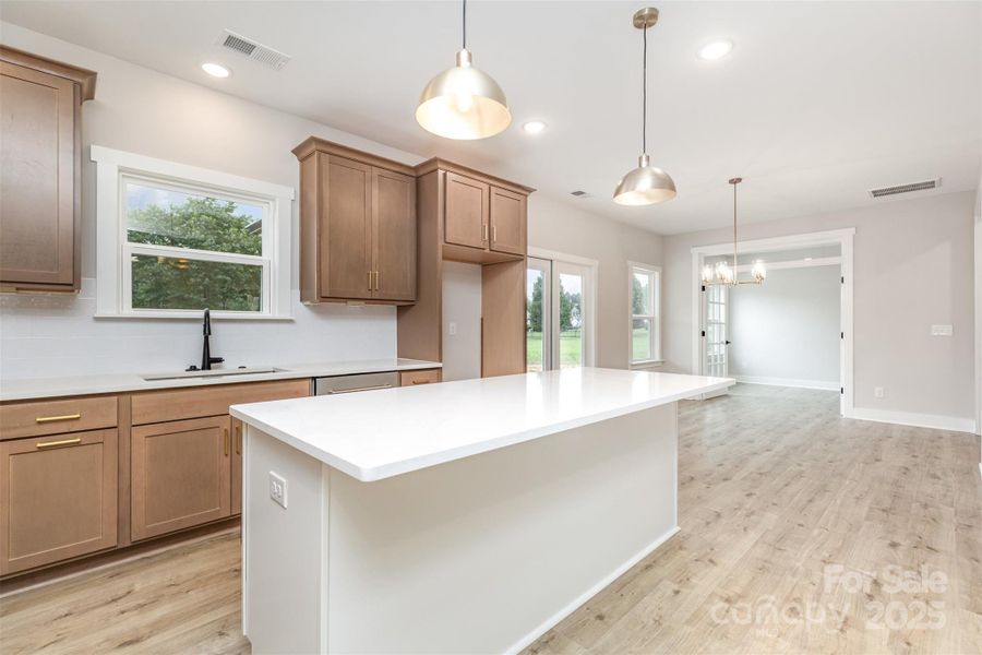 Kitchen into dining Kitchen into dining