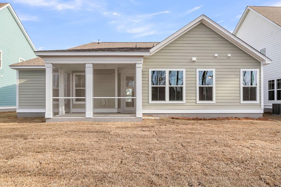 Exterior details and patio area of a home in Tidewater at Lakes of Cane Bay, Summerville (Image 3).