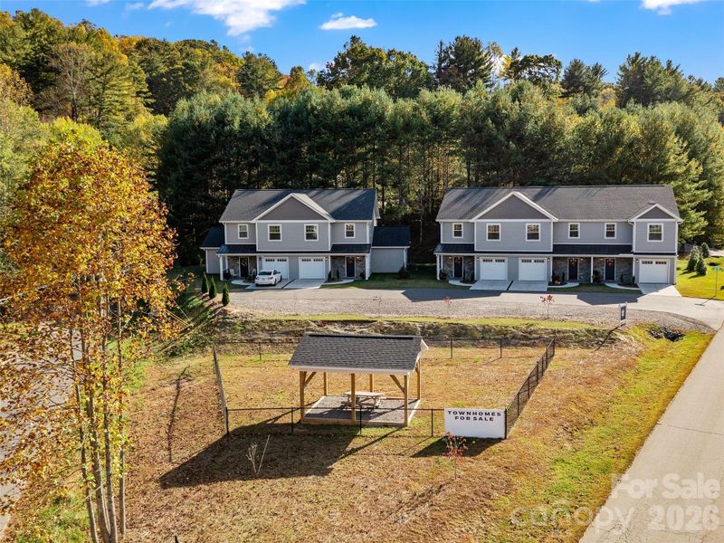 Front exterior of a new home in , Burnsville, NC, highlighting curb appeal (Image 20).