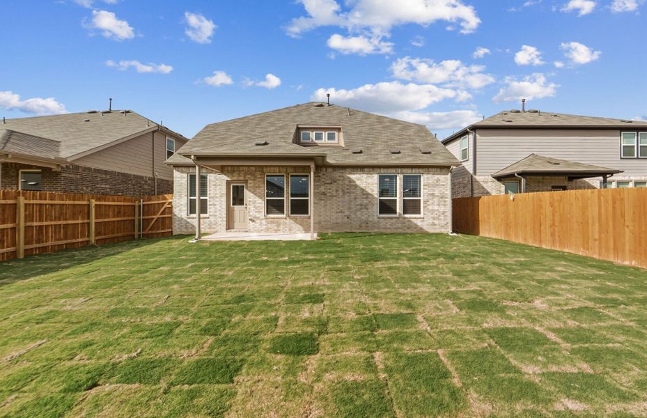 Exterior details and patio area of a home in Lagos, Manor (Image 22).