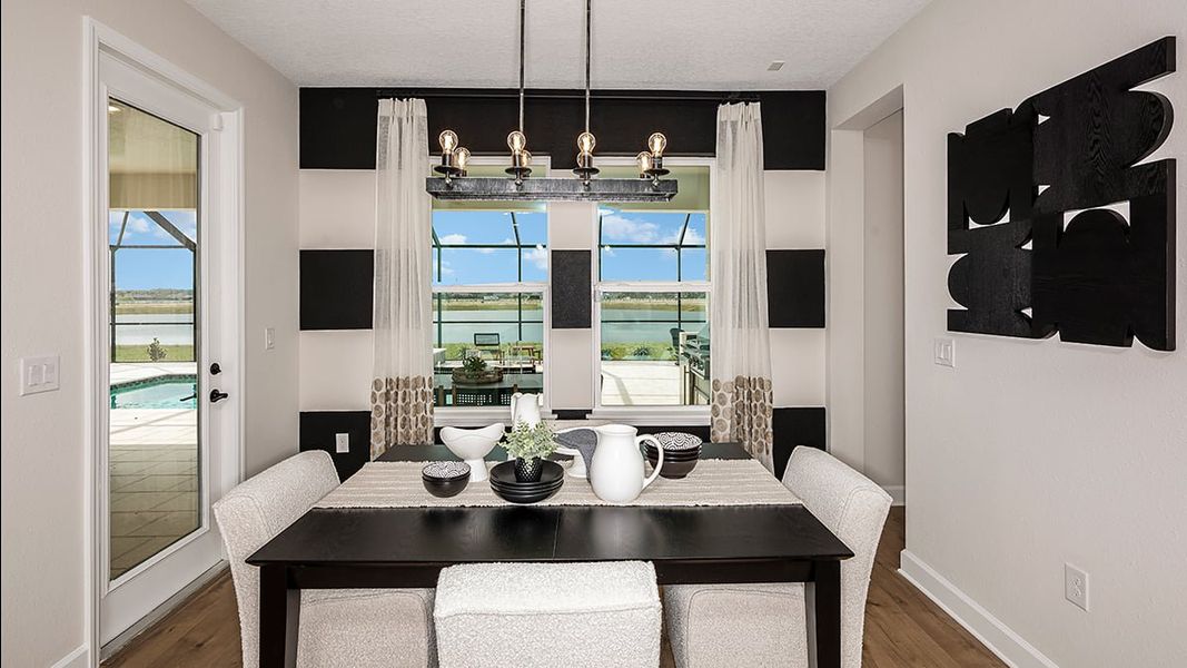 Representative furnished interior of a home built from the Bimini by Taylor Morrison in Ardisia Park, New Smyrna Beach (Image 14).