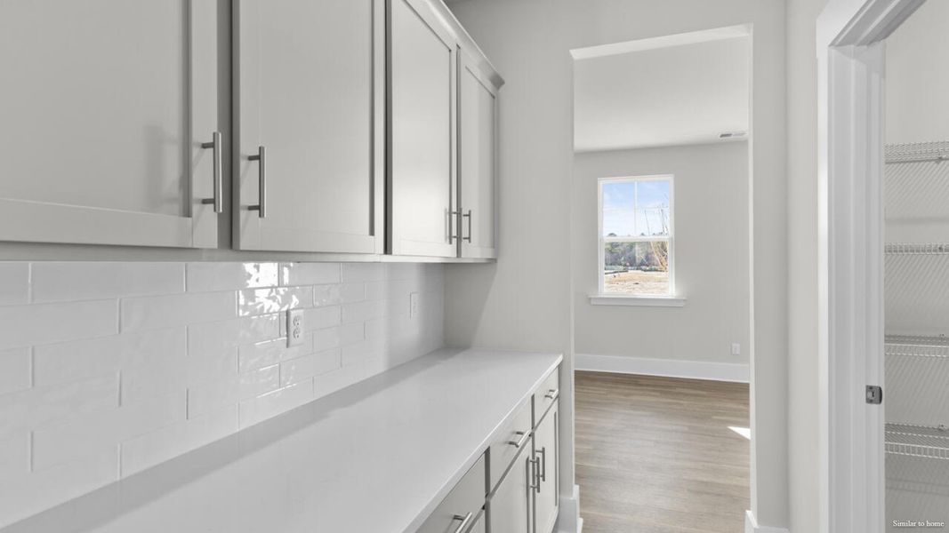 Furnished interior view inside a new home in The Haven at Indigo Preserve, Leland (Image 7).