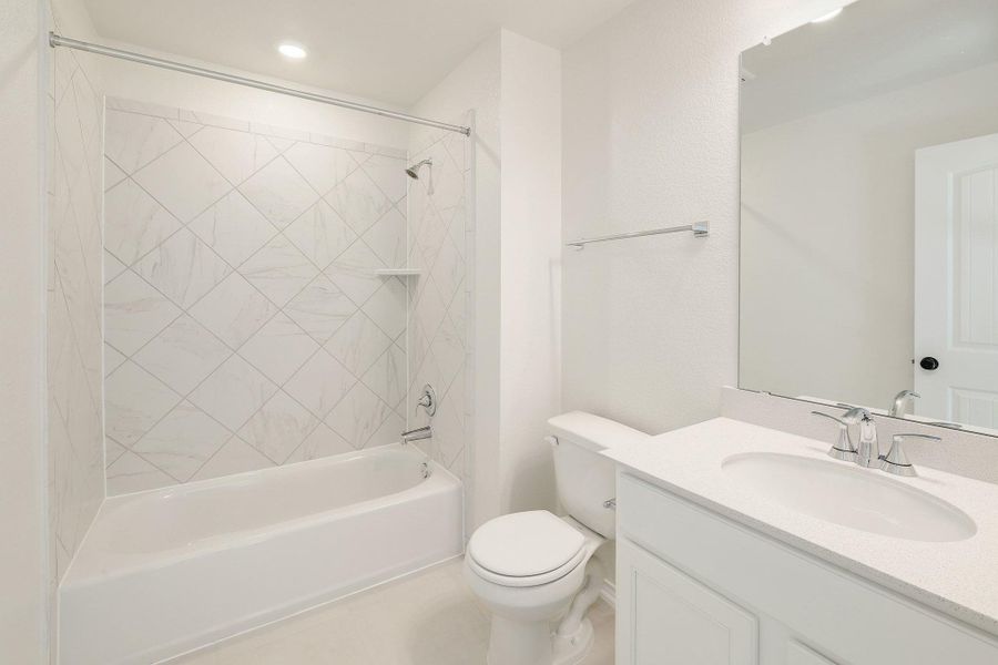 Furnished interior view inside a new home in River Bluff, Leander (Image 12).