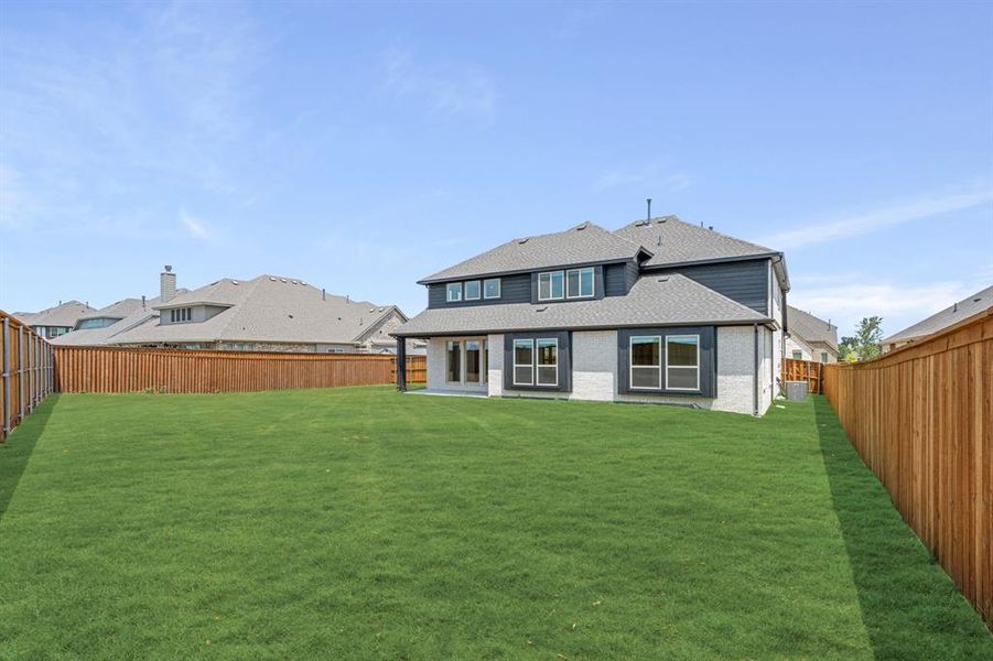 Front exterior of a new home in Terracina, Rockwall, TX, highlighting curb appeal (Image 25). Front exterior of a new home in Terracina, Rockwall, TX, highlighting curb appeal (Image 25).
