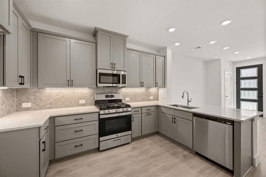 Our Julia plan offers a thoughtfully designed kitchen layout combined with beautiful finishes to create your dream kitchen!