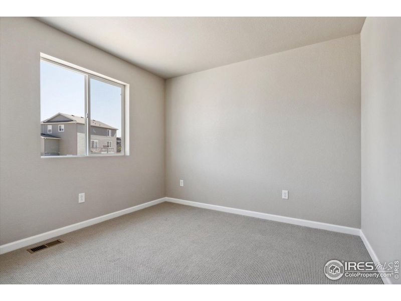 Spacious, unfurnished interior of a new home in The Overlook at Johnstown Farms, Johnstown (Image 10).