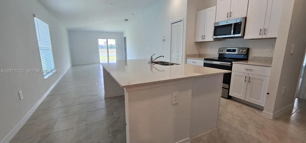 Furnished interior view inside a new home in , Lehigh Acres (Image 4). Furnished interior view inside a new home in , Lehigh Acres (Image 4).