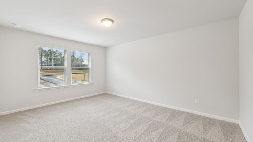Furnished interior view inside a new home in Hamilton Lakes, Loganville (Image 30).