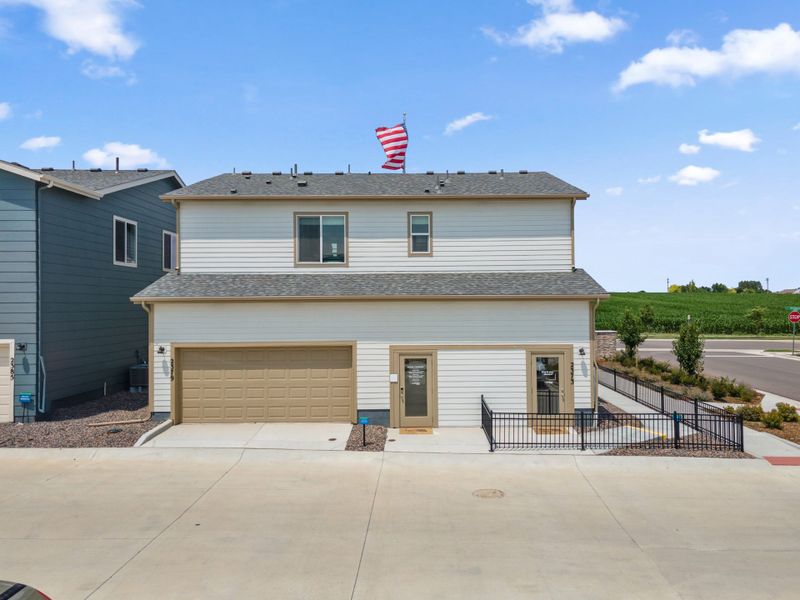 Representative exterior photo of a completed home built from the Biscayne by Landsea Homes in Pintail Commons at Johnstown Village, Johnstown, CO (Image 21).