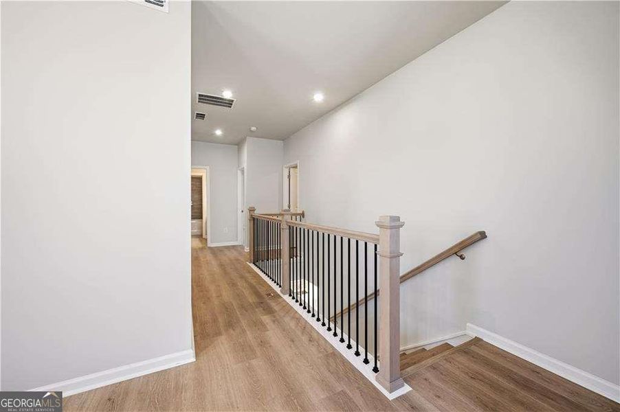Spacious, unfurnished interior of a new home in The Paddocks at Doc Hughes, Buford (Image 40).
