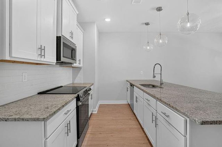 Furnished interior view inside a new home in The Cottages at East Lanier, Fayetteville (Image 8).