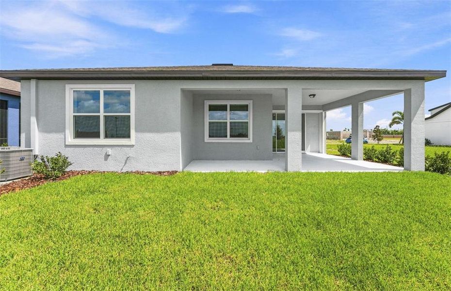 Exterior details and patio area of a home in Seaire, Parrish (Image 4).