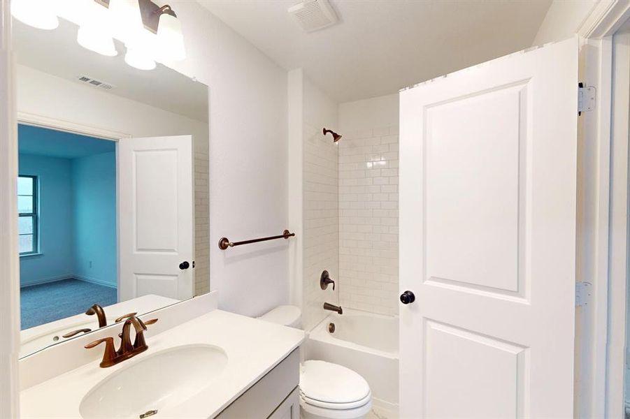 Furnished interior view inside a new home in Lilybrooke at Legacy Hills, Celina (Image 10).