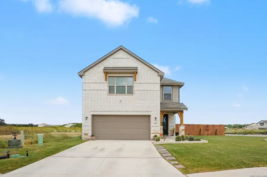 Front exterior of a new home in , San Antonio, TX, highlighting curb appeal (Image 1). Front exterior of a new home in , San Antonio, TX, highlighting curb appeal (Image 1).