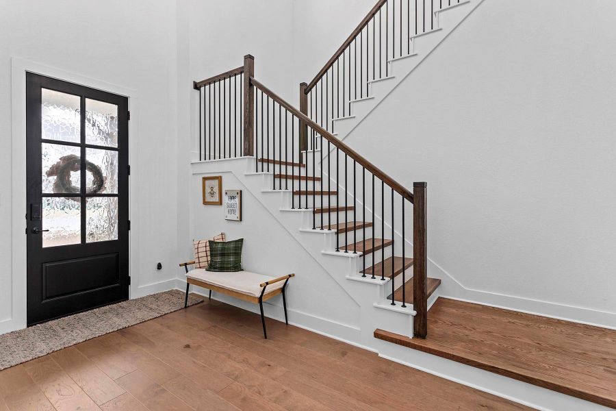 Foyer featuring wood-type flooring