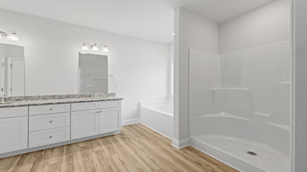 Representative furnished interior of a home built from the The Hawthorne by D.R. Horton in Meadows at Rehwinkel, Crawfordville (Image 23).