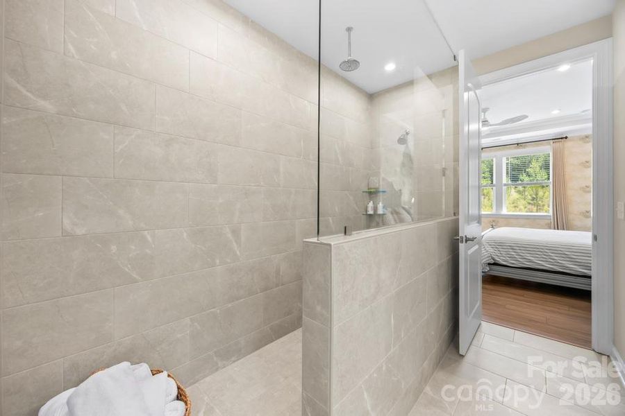 Primary bath with upgraded shower by sellers