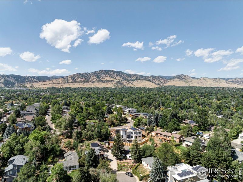 Located in Boulder, Colorado's ultra-desirable Alpine Drive in the Whittier neighborhood, this elegant modern home enjoys an unrivaled location on a coveted bluff just minutes from Downtown and Pearl Street.