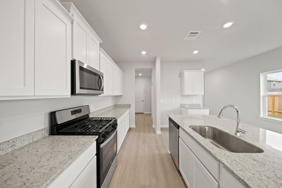 Furnished interior view inside a new home in Riverwood Ranch, Angleton (Image 4).