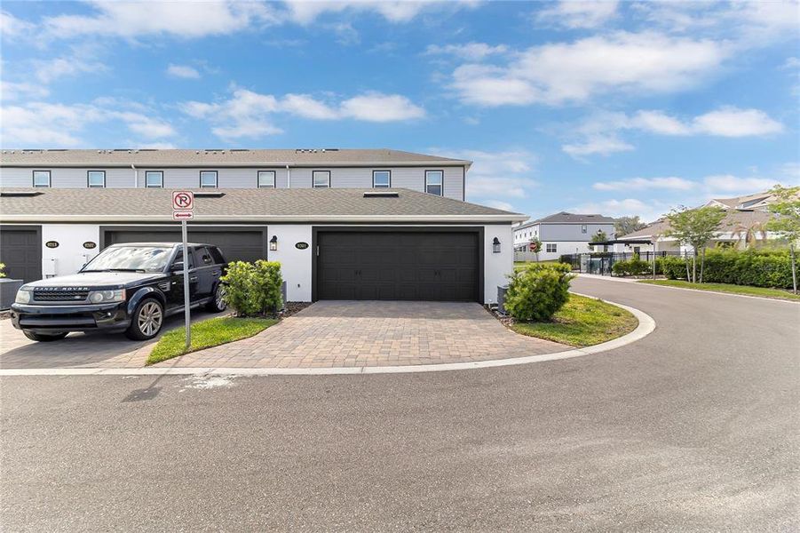 Front exterior of a new home in , Winter Garden, FL, highlighting curb appeal (Image 24).