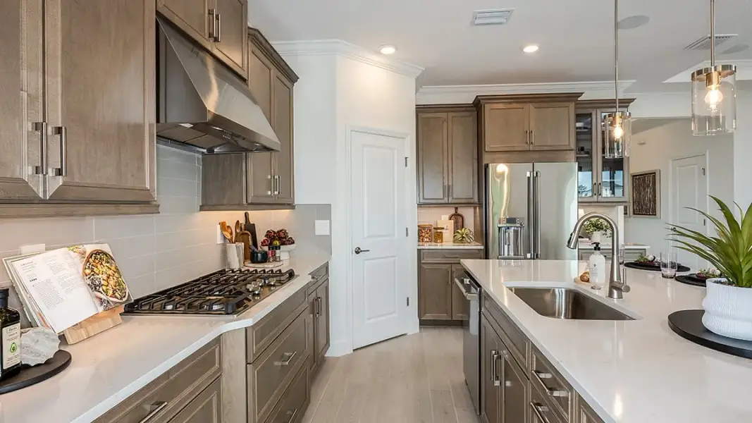 Representative furnished interior of a home built from the Bainbridge by Taylor Morrison in Azure at Solaeris, Port St. Lucie (Image 5).