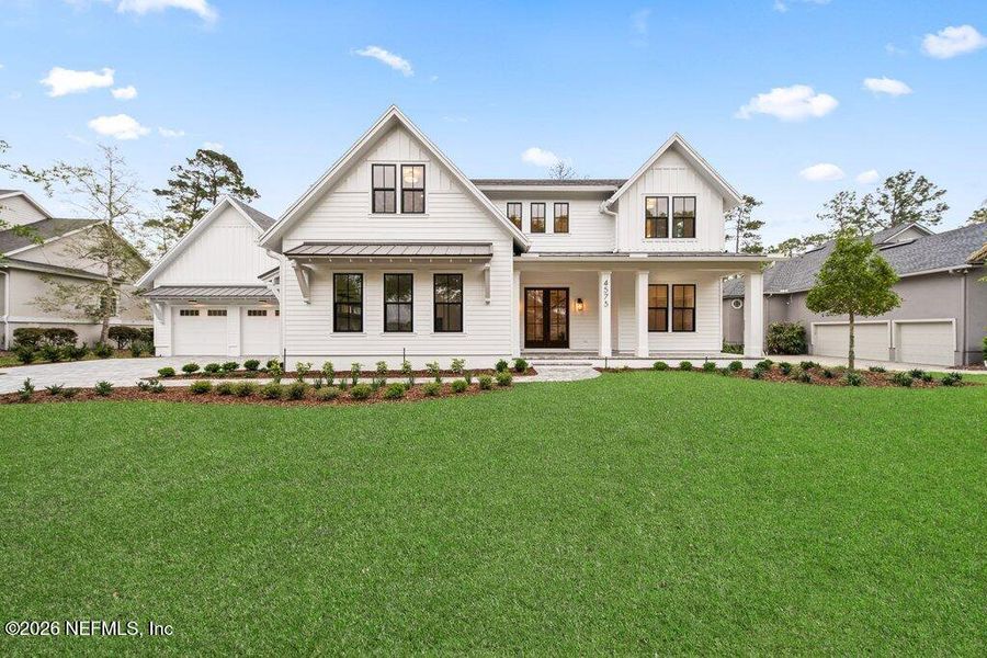 Front exterior of a new home in , Jacksonville, FL, highlighting curb appeal (Image 35).
