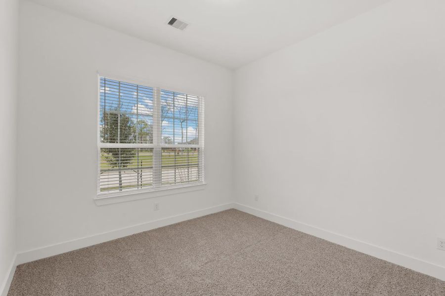 Representative unfurnished interior of a home built from the Mickelson by Chesmar Homes in Riceland Alley Loads, Mont Belvieu (Image 92).