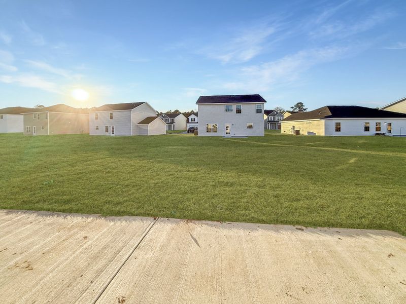 Exterior details and patio area of a home in Grand Reserve, Hinesville (Image 3).