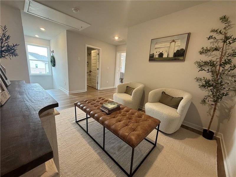 Furnished interior view inside a new home in The Towns at Auburn Station West, Auburn (Image 12).