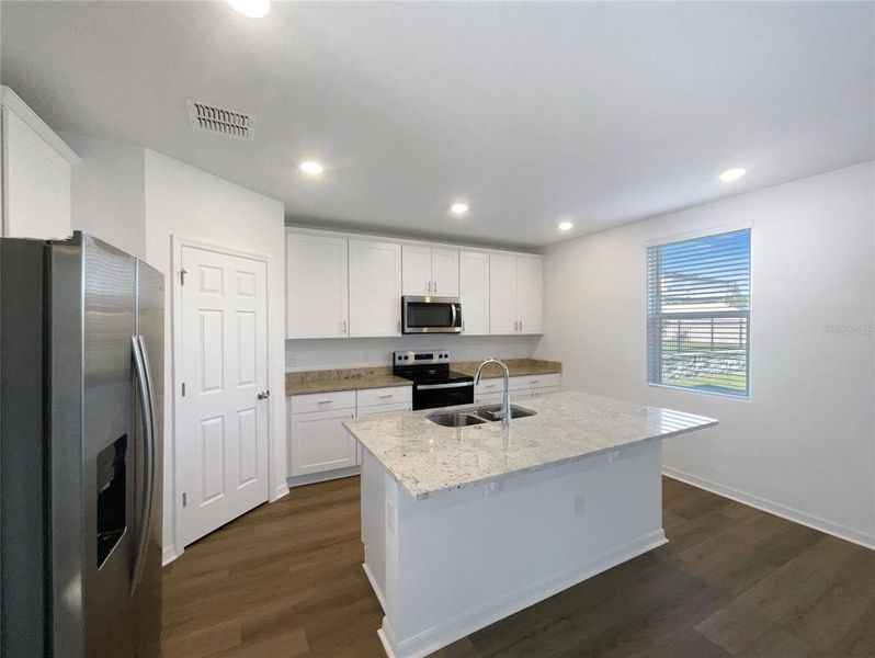Furnished interior view inside a new home in Eden Hills, Lake Alfred (Image 10).