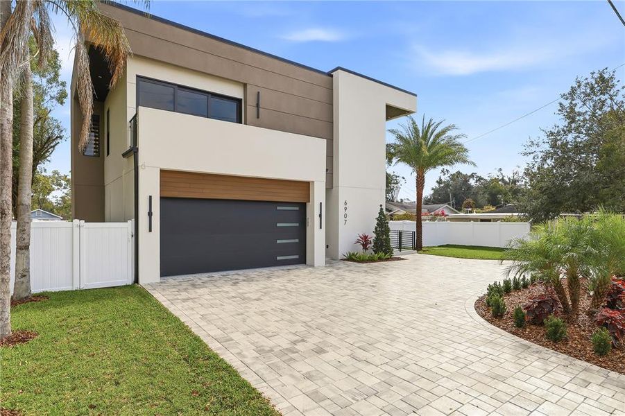 Front exterior of a new home in , Tampa, FL, highlighting curb appeal (Image 28).
